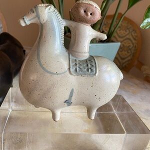 Mid century ceramic boy on horse.